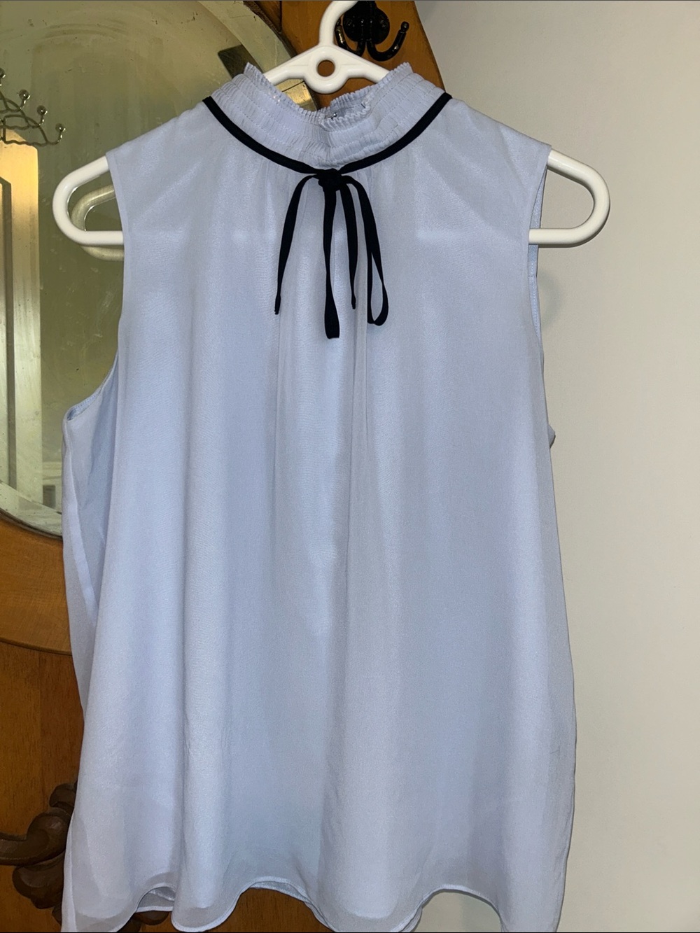 Sleeveless Light Blue Tie-Neck Blouse
